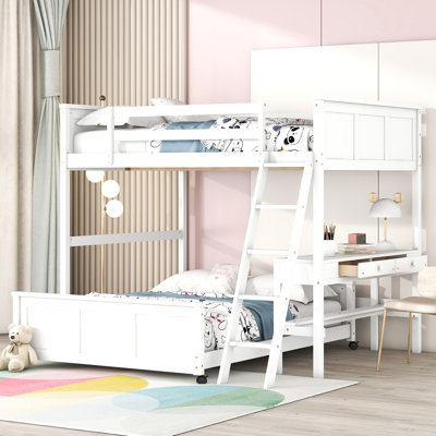 Lit double superposé au dessus d'un lit double avec bureau