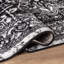 Tapis noir ivoire rétro à médaillon-951764636