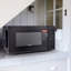 1.1 Cu Ft. 1000 Watt Counter Top Microwave Oven in Black