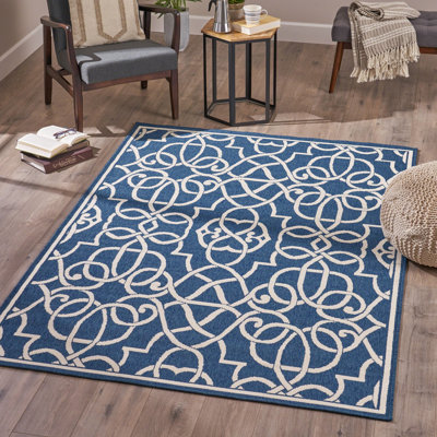 Élégant tapis d'extérieur à motif treillis argyle bleu marine et ivoire pour votre patio