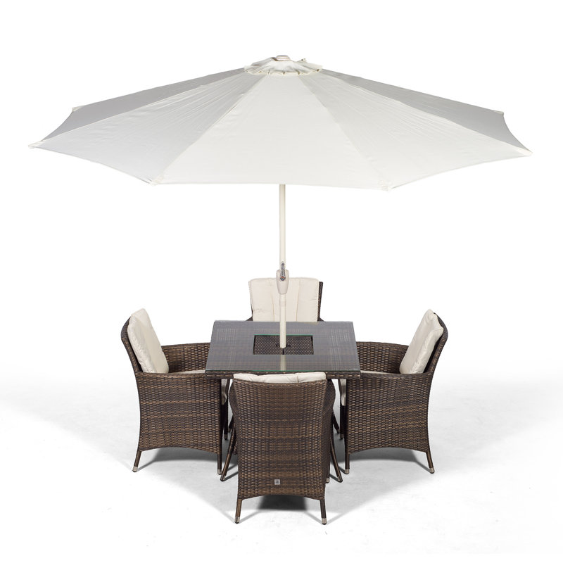 Karcher 4 - Person Wicker Patio Dining Set with Square Table , Cushions Included, Brown
