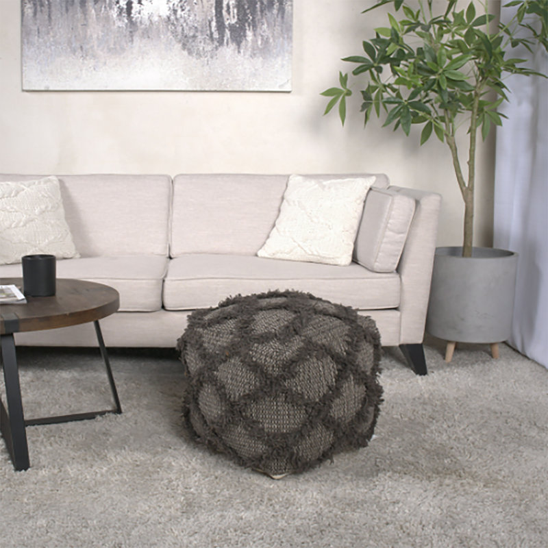 Pouf en laine et coton Jumanji