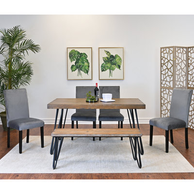 Ensemble de salle à manger complet avec table, chaises et banc pour une expérience culinaire améliorée et fonctionnelle à la maison