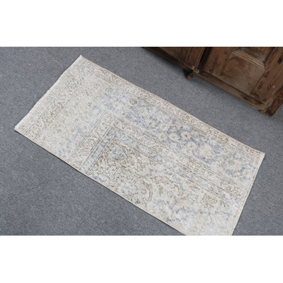Vintage Turkish Rug in Subtle Hues of Blue and Cream Featuring Intricate Geometric Designs