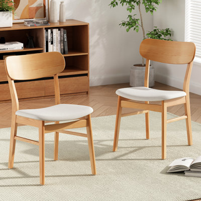 Lot de 2 chaises de salle à manger avec coussins en tissu beige, pieds robustes et stables en bois d'hévéa massif, idéales pour l'aménagement de votre pièce.