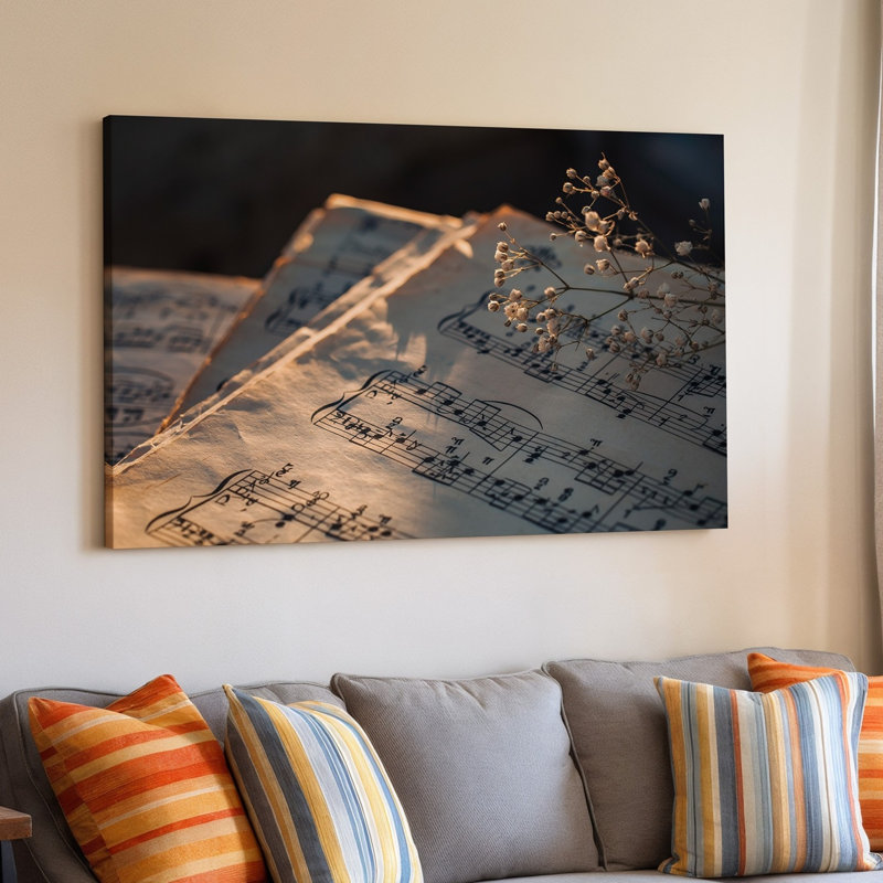 Toile, scène doucement éclairée avec gros plan d'une feuille d'art musical avec notes délicates et symboles imprimés à l'encre noire