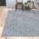 Trombetta Hand Woven Area Rug in Dark Blue/Ivory