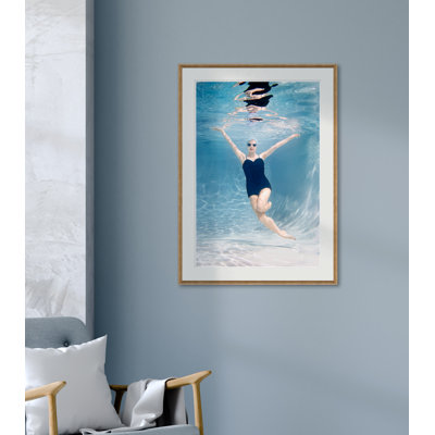 Caucasian Woman Swimming Underwater Giclee Print by Getty Images