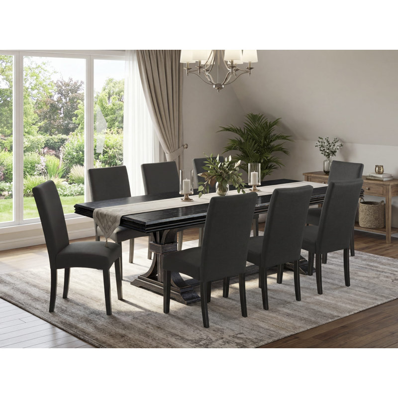 Cet ensemble de cuisine 9 pièces comprend une table de salle à manger et 8 chaises de cuisine en tissu de lin noir avec dossier rembourré au fini noir sablé.