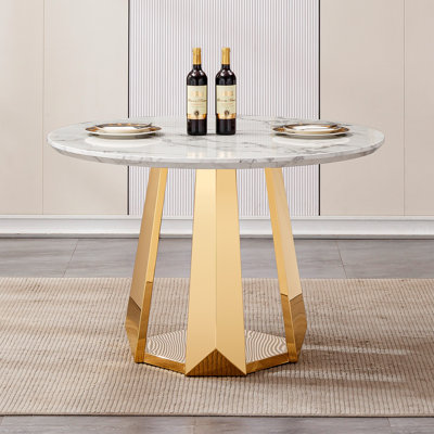 Table de salle à manger sophistiquée en marbre à texture moderne avec base en acier inoxydable pour une utilisation polyvalente dans la salle à manger