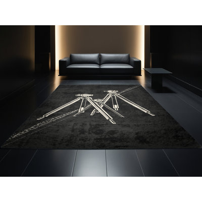 Tapis géométrique moderne et contemporain à motif trépied lavable à la machine gris Oweda