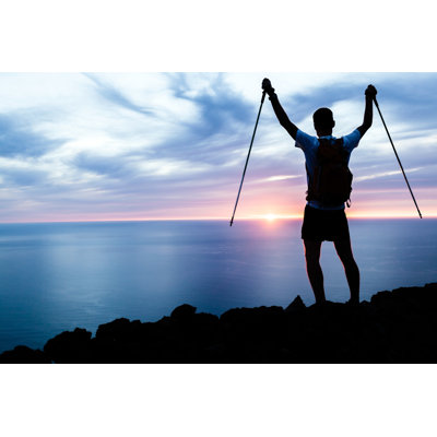 Man Hiking Silhouette by Blyjak - Wrapped Canvas Print
