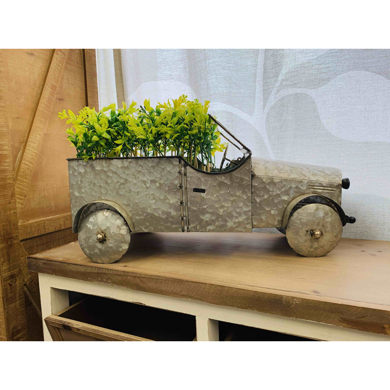 Reproduction en métal de modèle de camion avec motif floral