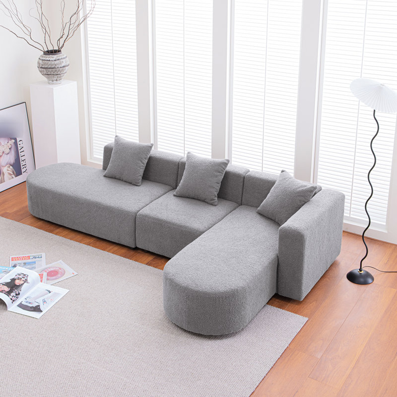 Siège courbé moderne faisant face à la droite - Revêtement gris Boucle pour un salon élégant et confortable