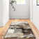 Rotonya Floral Area Rug in Chocolate