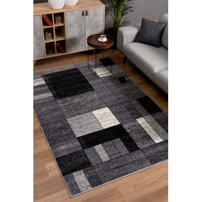 Tapis à motif géométrique gris / noir 7 pi x 9 pi (6 pi 6 po x 9 po 4 po) Branch Branch Sama, tapis contemporain, à poils moyens et résistant aux taches