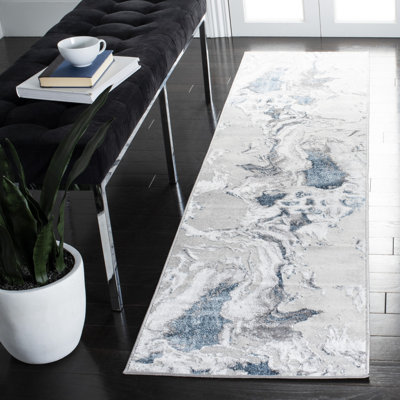 Tapis gris à motif abstrait Castrovinci