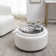Savinien Upholstered Round Storage Ottoman