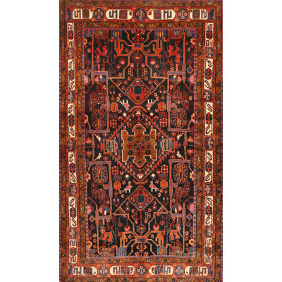 Tapis oriental brun / rouge