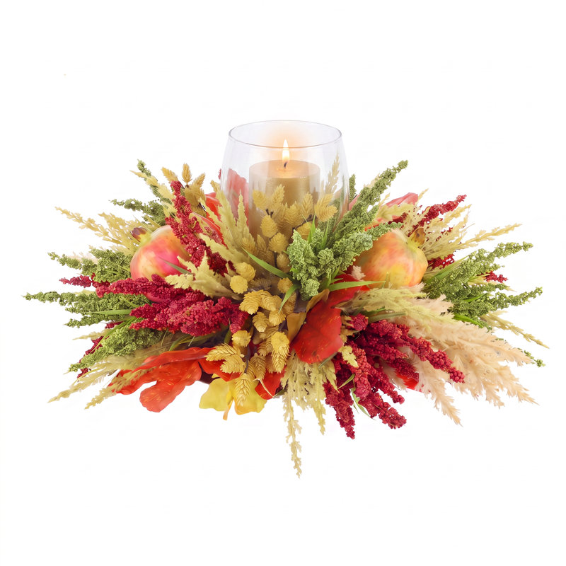 Bougeoir d'automne avec bruyère, pampas et grenades