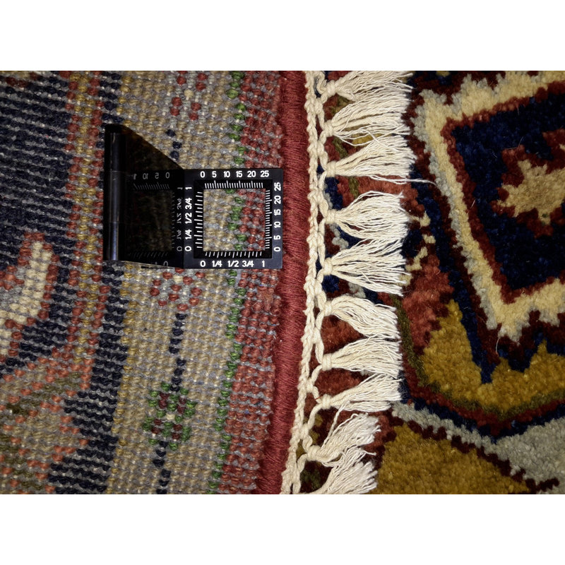 Kelene Oriental Area Rug in Red