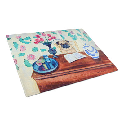 Caroline's Treasures Pug Reading in the Kitchen Glass Cutting Board