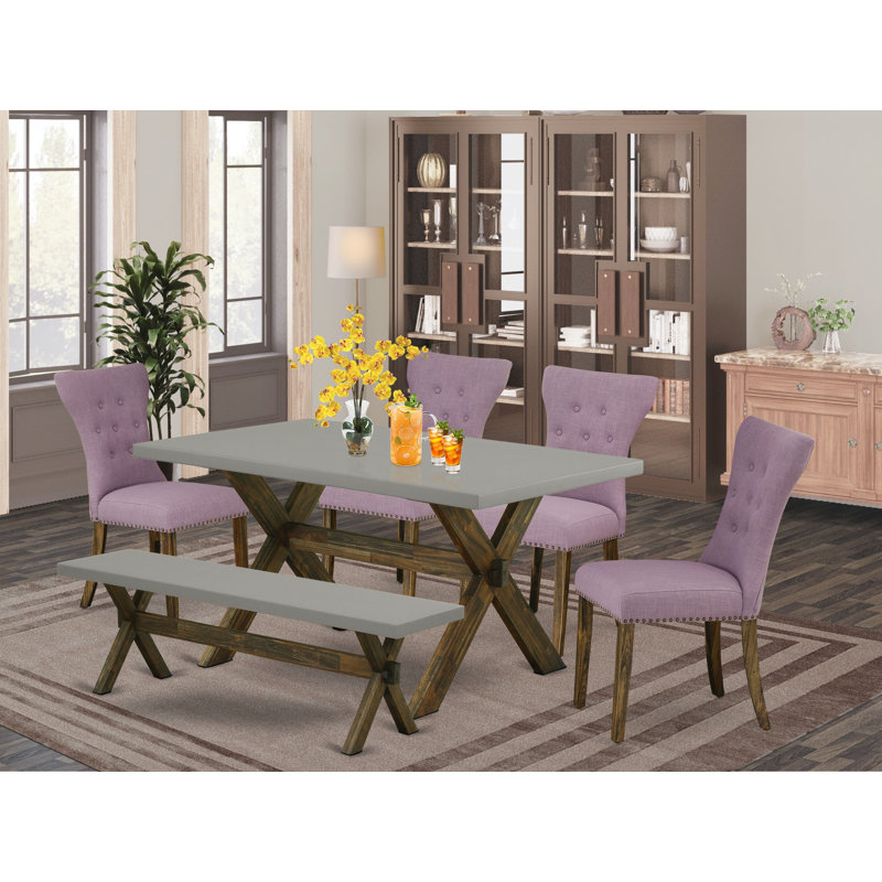L'ensemble de salle à manger 6 pièces contient une table de salle à manger rectangulaire avec des pieds en X et 4 chaises Parson en lin Dahlia avec un banc, finition jacobine patinée
