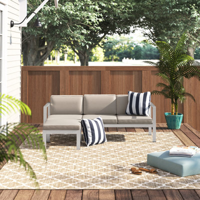 Canapé modulaire d'extérieur en aluminium avec coussins Pangea Home Karen 3 places avec repose-pieds assorti, structure antirouille et coussins durables