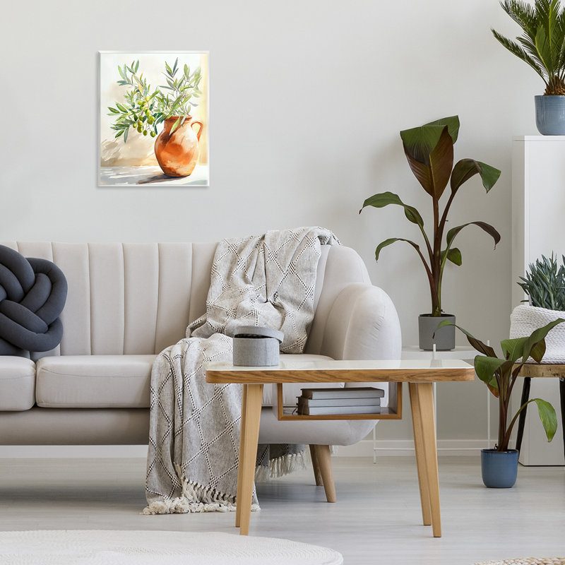Plaque murale olive dans un vase en terre cuite, design par LSR Design Studio