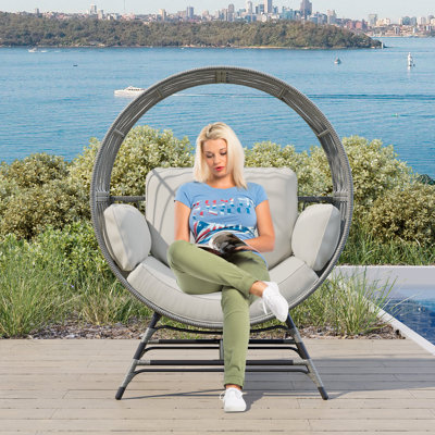 Fauteuil pour patio en osier avec coussin
