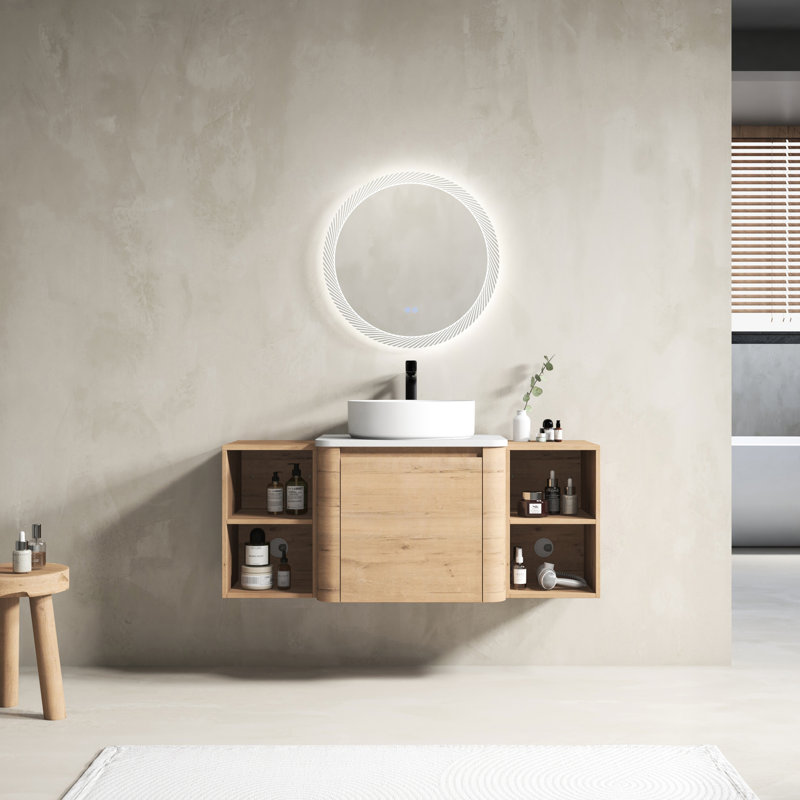 Meuble-lavabo de 122 cm (48 po) comprenant un lavabo en céramique artistique, 2 tablettes de rangement, une porte à fermeture amortie, un revêtement en contreplaqué élégant, un aspect chêne imitation, une poignée design de 45 cm (45 po) et des bords d'armoire arrondis.