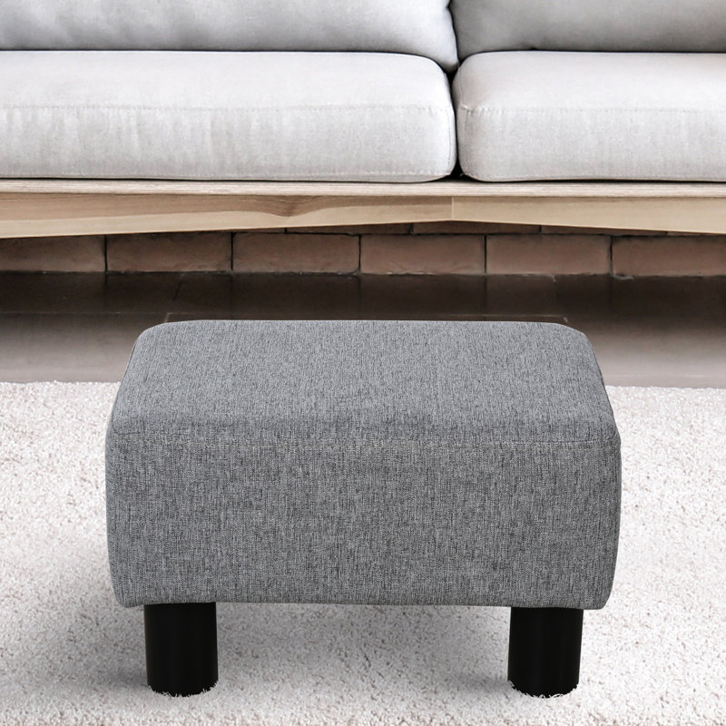 Tabouret gris avec tissu en lin et pieds en plastique stables pour un repos reposant dans le salon, petit usage