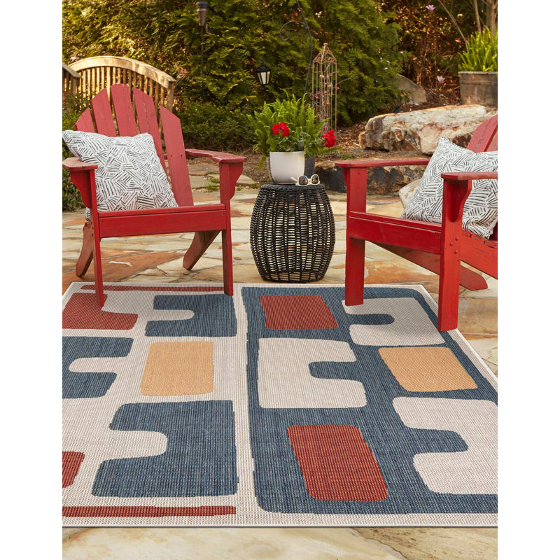 Tapis intérieur / extérieur en polypropylène tissé à la machine Dreson de couleur turquoise / beige / orange