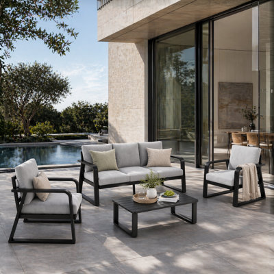 Ensemble de meubles d'extérieur en aluminium avec canapé, deux chaises, table basse et coussins