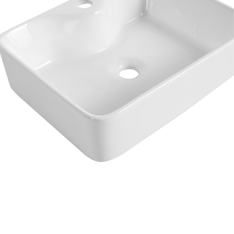 Lavabo de salle de bain rectangulaire en céramique blanc au-dessus du comptoir - attrait minimaliste moderne bien conçu