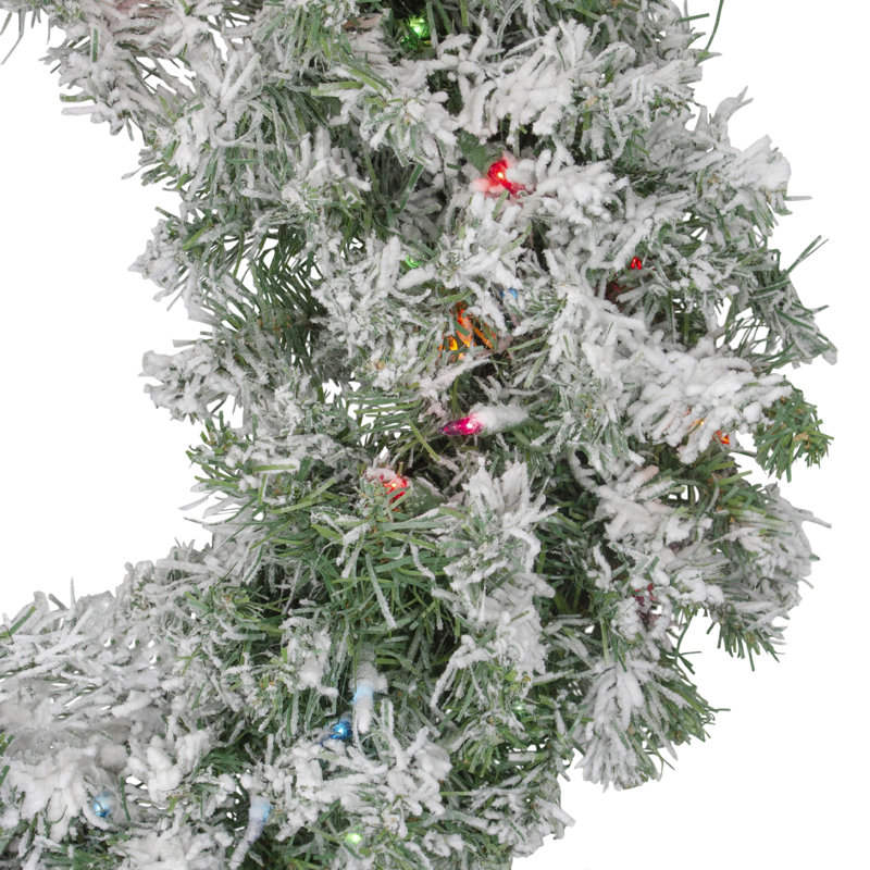 Couronne de Noël artificielle pré-éclairée avec flocons de 24 po