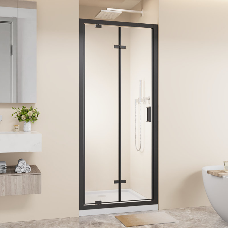 Porte de douche pivotante pliante avec cadre 32 po x 72 po peu encombrante, verre trempé transparent de 1/4 po avec poignée en acier inoxydable, installation réversible, noir