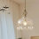 Luminaire suspendu vintage en verre et laiton