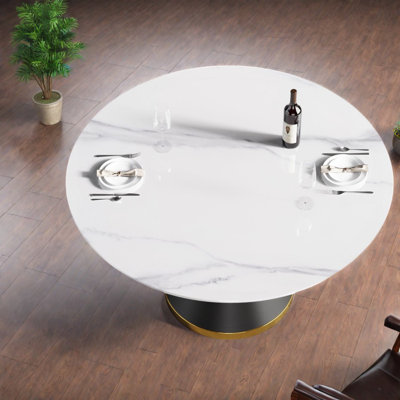 Table de salle à manger en pierre frittée durable avec base en acier au carbone, conception ronde moderne pour les repas en famille