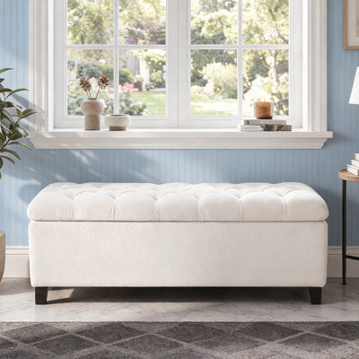 Pouf avec rangement, surface en bouclÃ© et pieds en bois d'hÃ©vÃ©a, capacitÃ© de 136 kg, pour un intÃ©rieur moderne