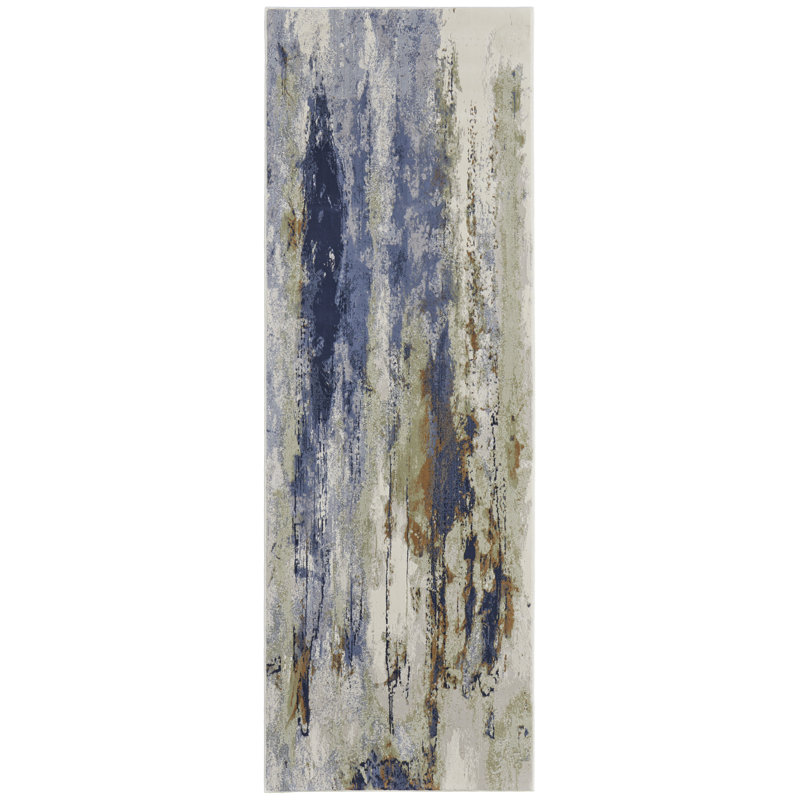Tapis bleu, orange et ivoire