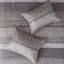 Ensemble de couette 7 pièces pour lit Queen. Gris/taupe. Comprend une couette, 2 taies d'oreiller, 3 coussins décoratifs et 1 cache-sommier. Entretien facile avec un linge brun uni lavable à la machine.