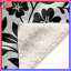 Couvertures florales noires et blanches-130657821