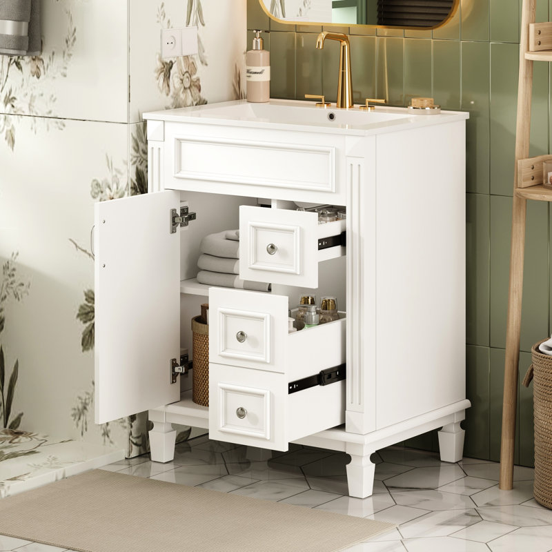 Meuble-lavabo de 61 cm (24 pouces) avec lavabo en céramique, 2 tiroirs et tablette réglable. Alliant simplicité française et rangement moderne, il est idéal pour les petites salles de bain et permet un gain d'espace optimal.