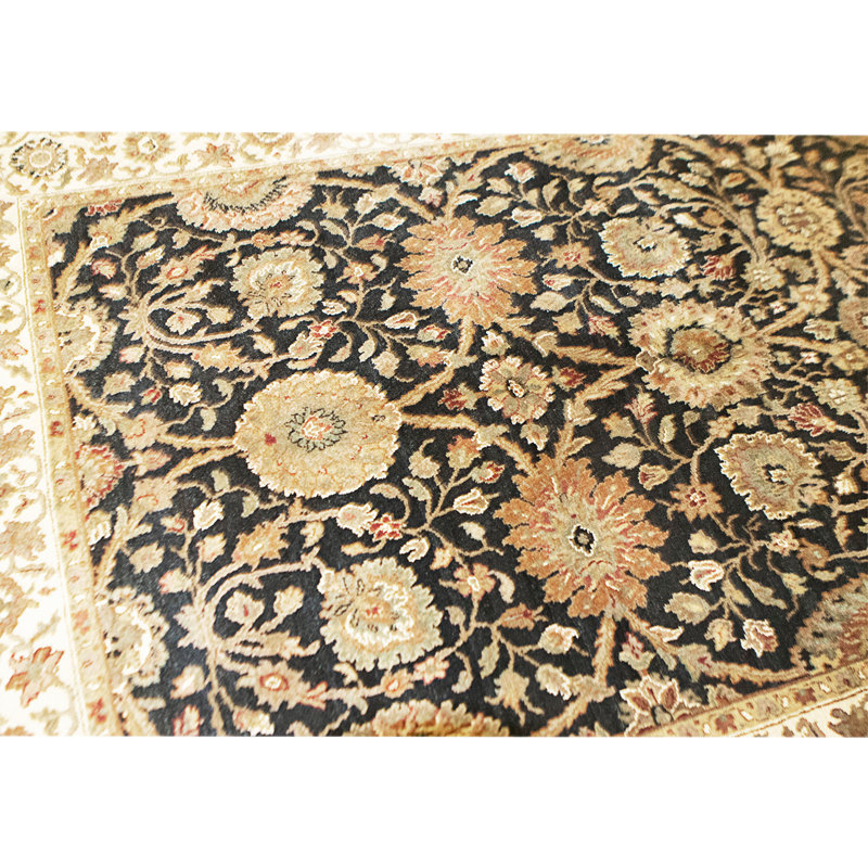 Hand Knotted Wool Area Rug in Black And Gold