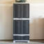 Armoire de rangement verrouillable avec 3 tablettes réglables et tiroir inférieur - Gris