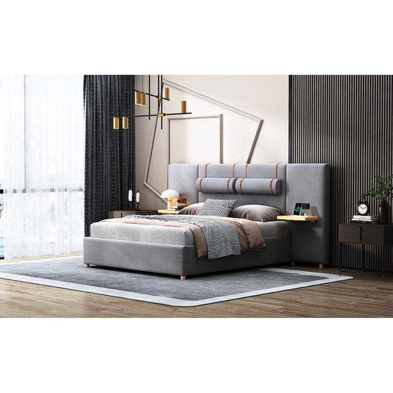 Grand lit tapissier en velours gris avec prises de courant et rangement électrique pratique