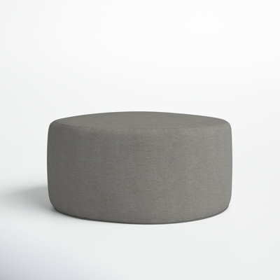 Hania Round Upholstered Outdoor Ottoman with Sunbrella® Cushion