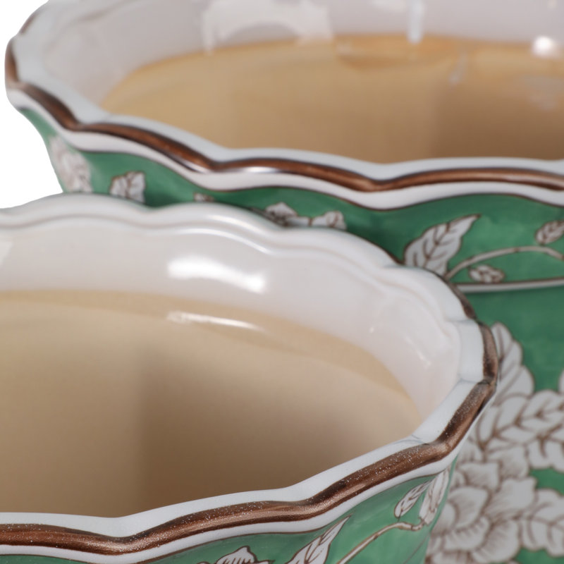 Set Of 2 Ceramic Planters With Embossed Floral Detailing And Scalloped Rims