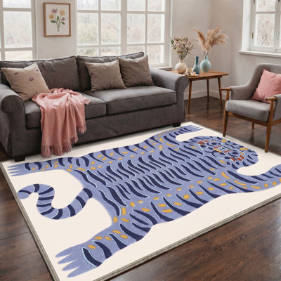 Tapis bleu / bleu marine / ivoire à imprimé animalier Abidi Funky